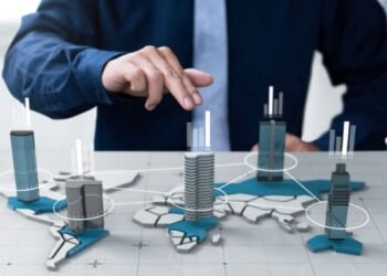 empresario mostrar grafico empresa beneficios pantalla mapa digital mundial 828x548